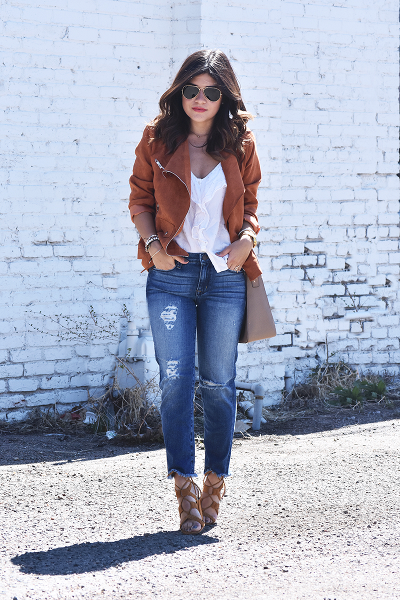 suaede jacket and ripped jeans look