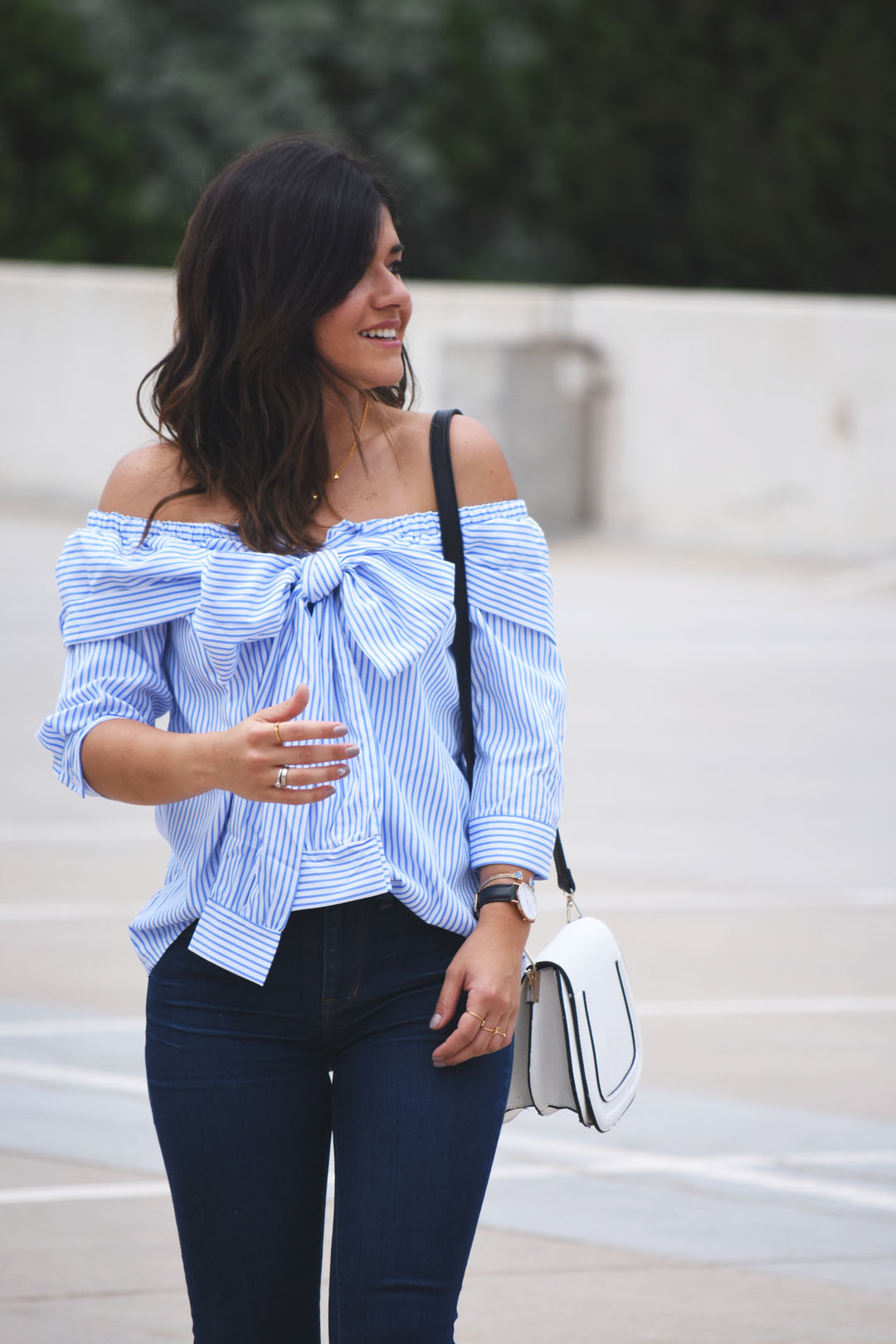 Carolina Hellal of Chic Talk wearing a SheIn off the shoulder top and Daniel Wellington black leather watch
