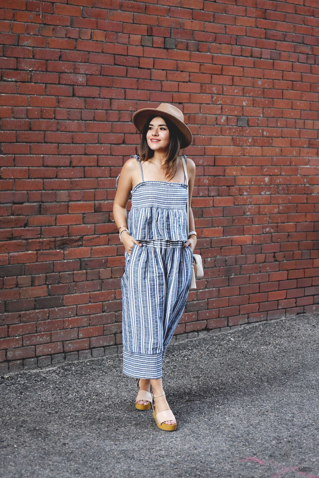 Carolina Hellal of the fashion blog Chic Talk wearing a Chicwish set of top and pants, and Sam Edelman sandals