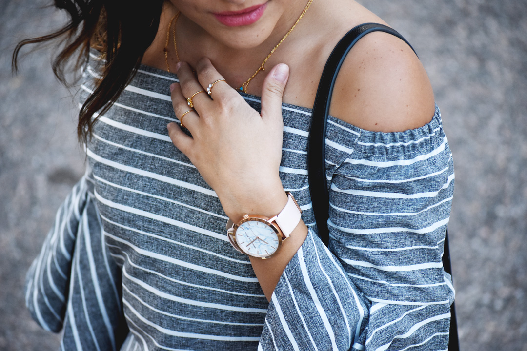 Gorjana dainty necklace, Christian Paul watch, and Pueblo L.A gold rings.