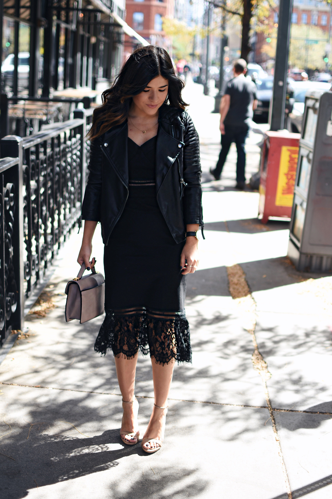 Carolina Hellal of Chic Talk wearing a Chicwish black lace dress, Topshop faux leather jacket, Mellow World bag and Steve Madden nude sandals
