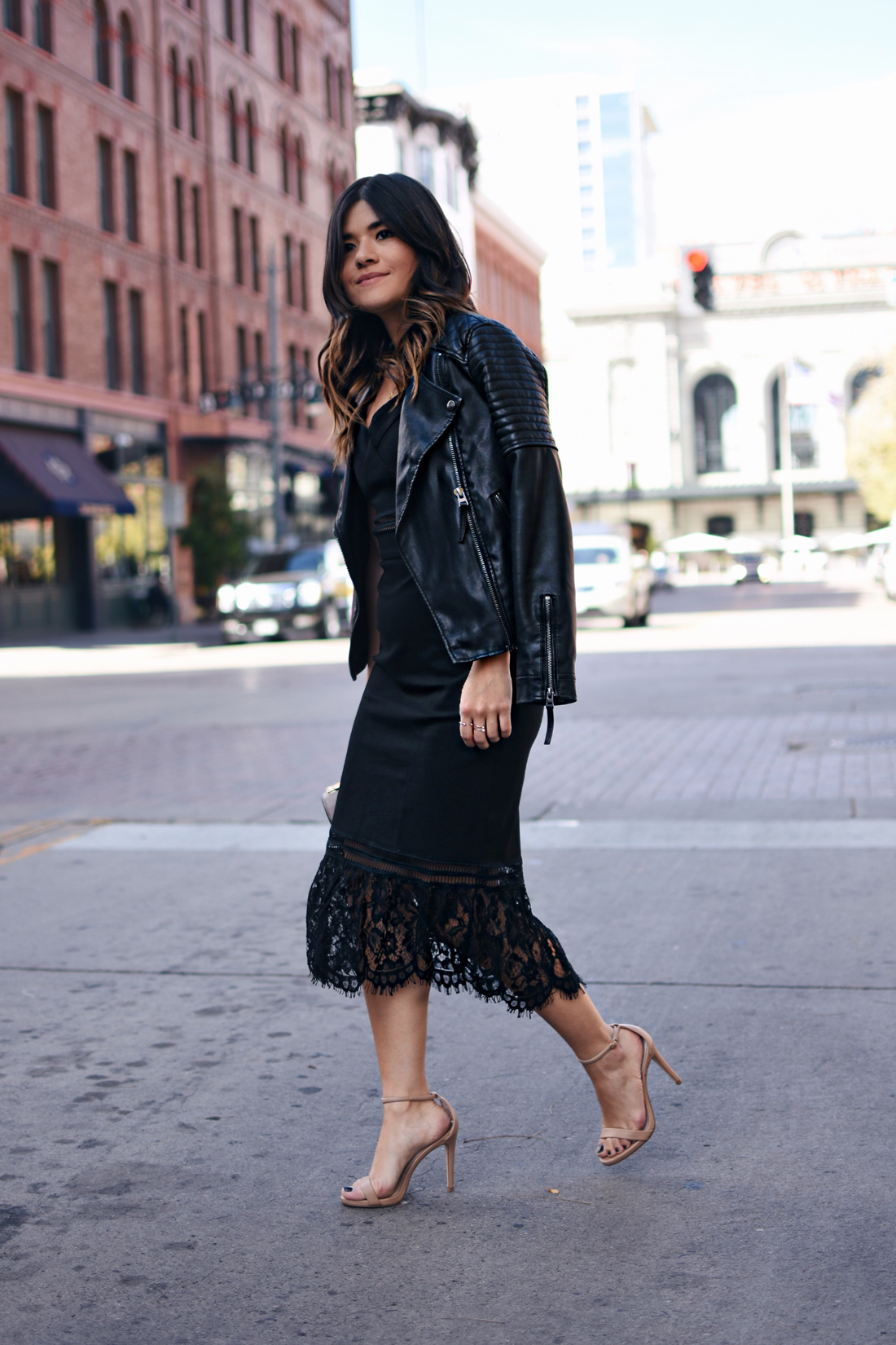Carolina Hellal of Chic Talk wearing a total black look with a Chicwish dress and Topshop faux leather jacket