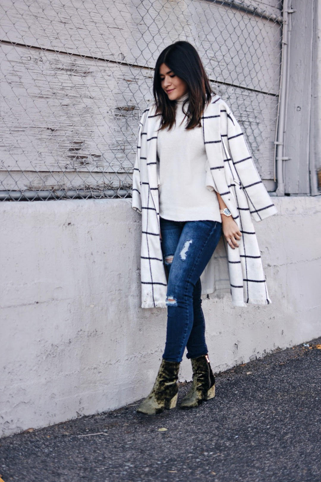 Carolina Hellal of Chic Talk wearing a Chicwish plaid coat, American Eagle jeans and EGO green velvet booties