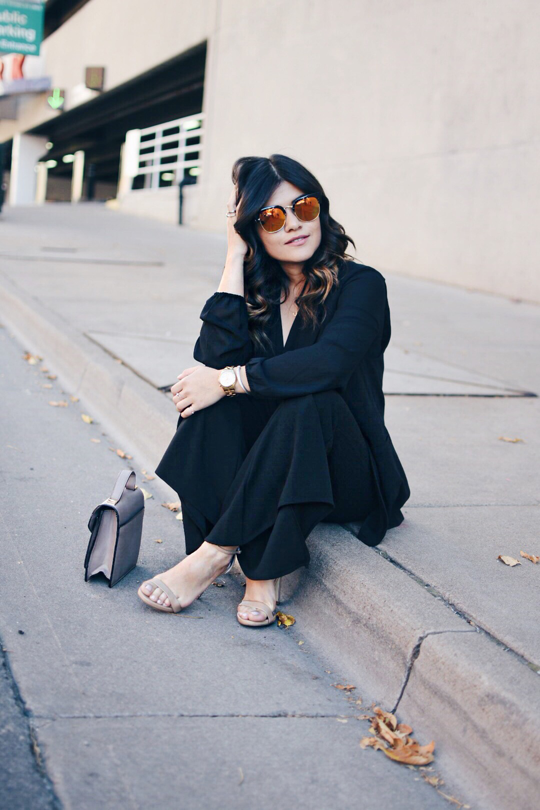 Carolina Hellal of Chic Talk wearing a Forever21 black chiffon top, SheIn bell bottom pants, Kensie black vest and Steve Madden nude strap sandals