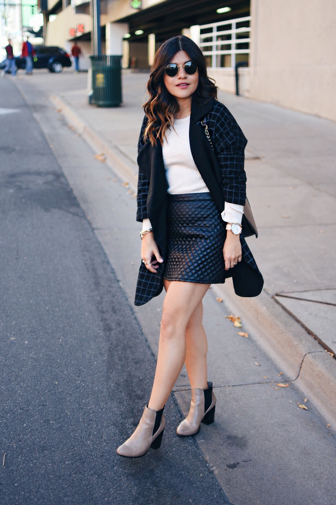 Carolina Hellal of Chic Talk wearing a VIPme plaid coat, Forever21 faux leather skirt, Stage beige sweater and Forever21 nude booties