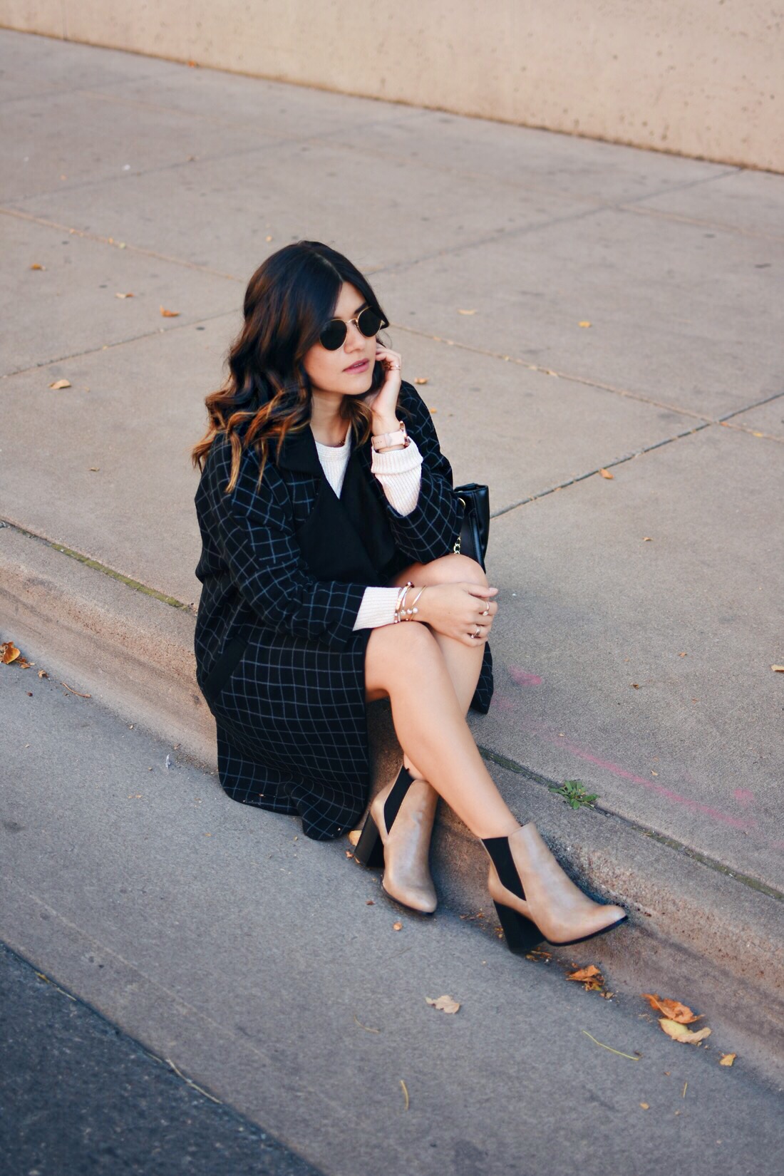 Carolina Hellal of Chic Talk wearing a VIPme plaid coat, Forever21 faux leather skirt, Stage beige sweater and Forever21 nude booties