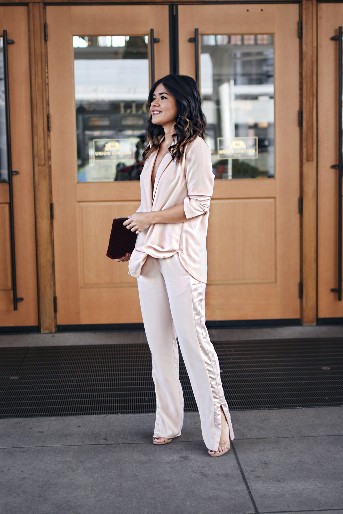 Carolina Hellal of Chic Talkw wearing the H&M holiday collection, Steve Madden nude sandals and Old Navy burgundy velvet clutch