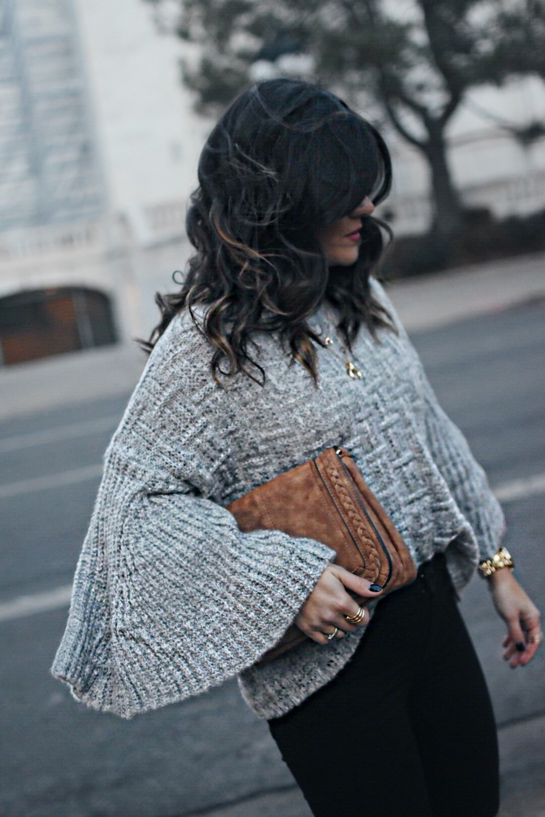Carolina Hellal of Chic Talk wearing a Shein sweater and Violet Ray bag