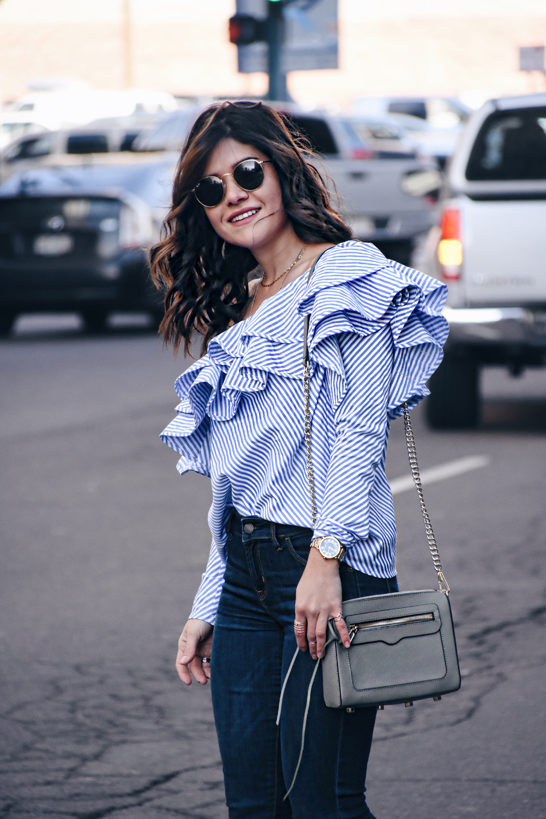 Carolina Hellal of Chic Talk wearing a Chicwish ruffle top, Paige skinny jeans, Sam Edelman nude pumps and Olive green Rebecca Minkoff bag