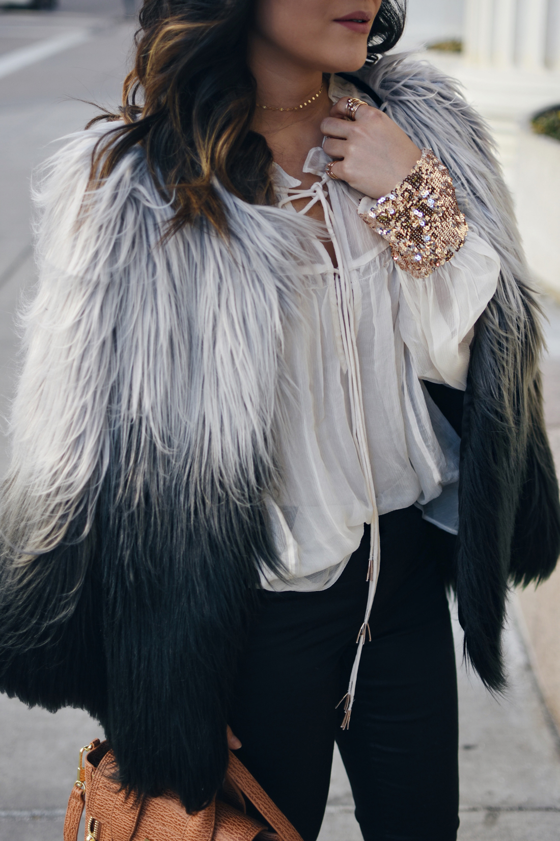 Carolina Hellal of Chic Talk wearing the perfect Faux fur coat via Chicwish
