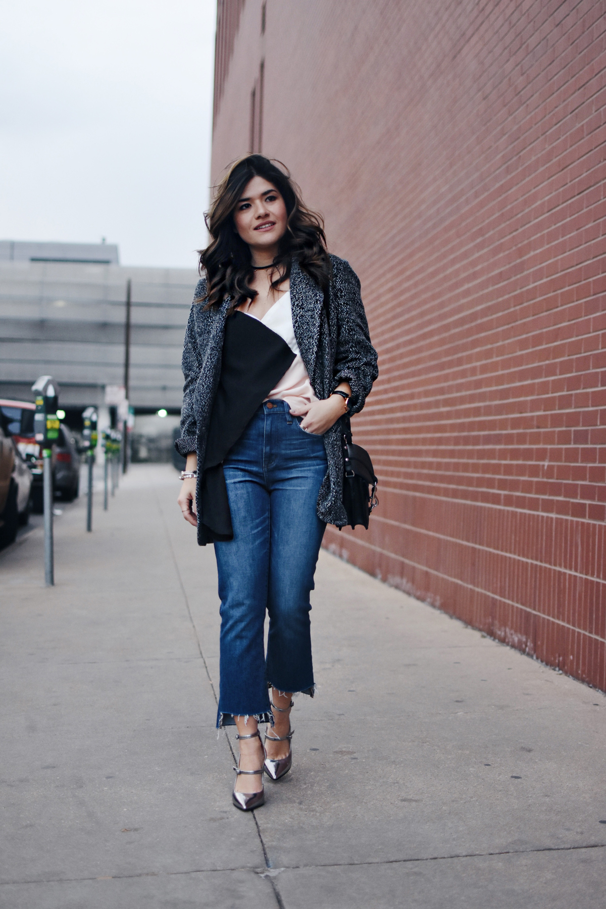 Carolina Hellal of Chic Talk wearing a Shein top and jacket, Madewell jeans, Rebecca Minkoff bag, and Marc Fisher silver pumps