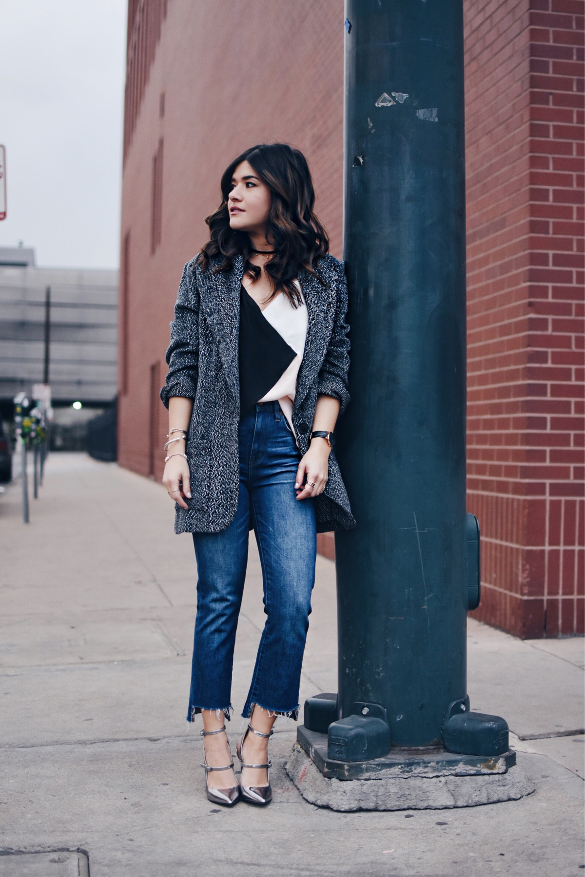 Carolina Hellal of Chic Talk wearing a Shein top and jacket, Madewell jeans, Rebecca Minkoff bag, and Marc Fisher silver pumps