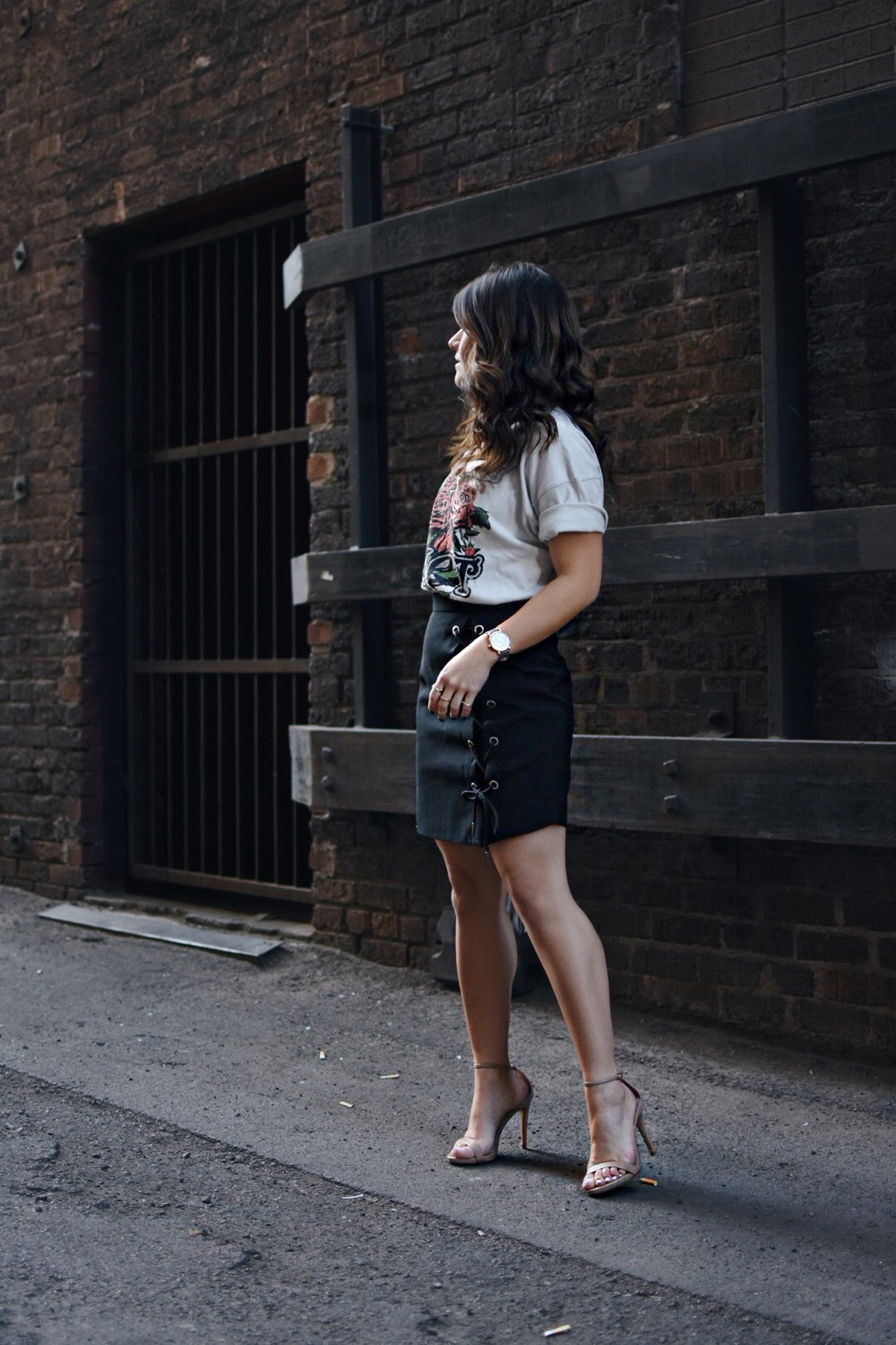 Carolina Hellal of Chic Talk wearing a Topshop t-shirt, Chicwish lace up skirt, See by Chloé bag, and Steve Madden high heels