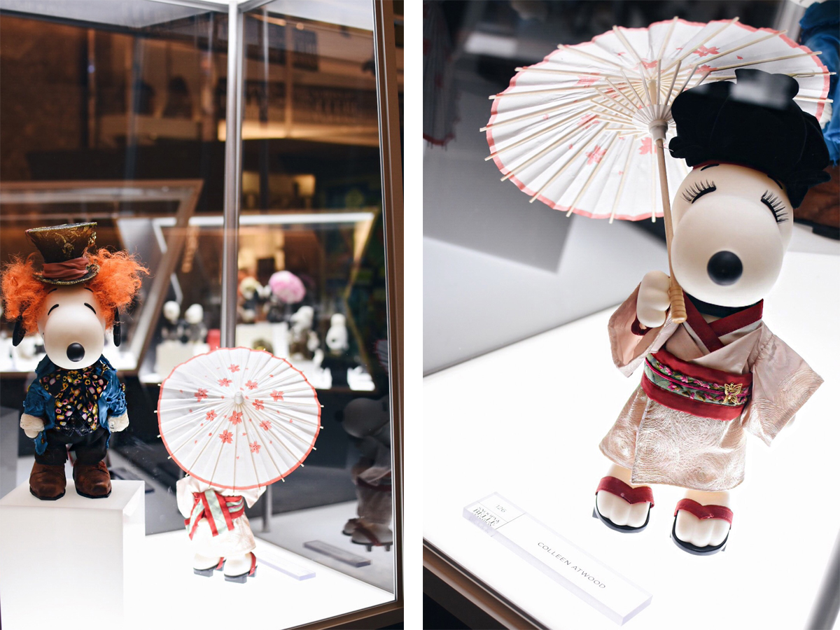 Snoopy & Bella in fashion exhibition at Cherry Creek Mall in Denver featuring mini couture outfits from the world's foremost designers.