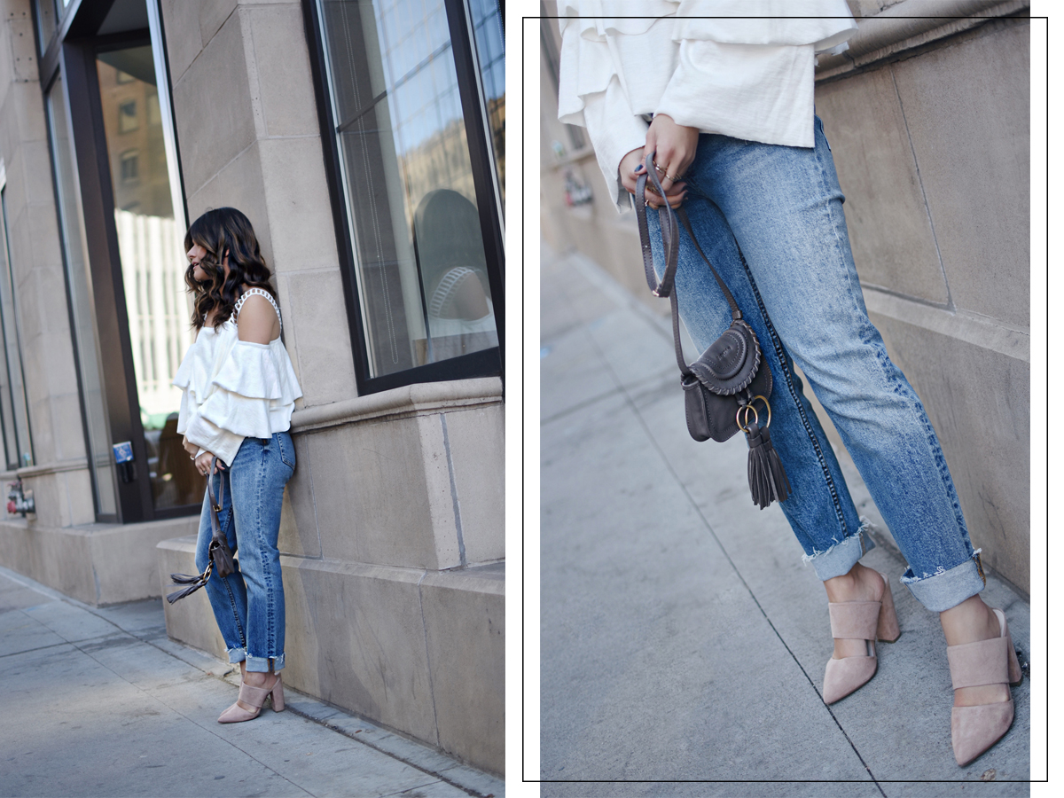 Carolina Hellal wearing a Moon River ruffle top, H&M straight jeans, na-kd nude mules, and See by Chloé polly crossbody bag
