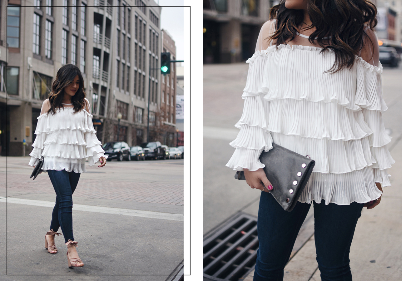 Carolina Hellal of Chic Talk wearing a Chicwish white ruffled, skinny jeans, topshop blush lace up sandals and Hammitt leather clutch