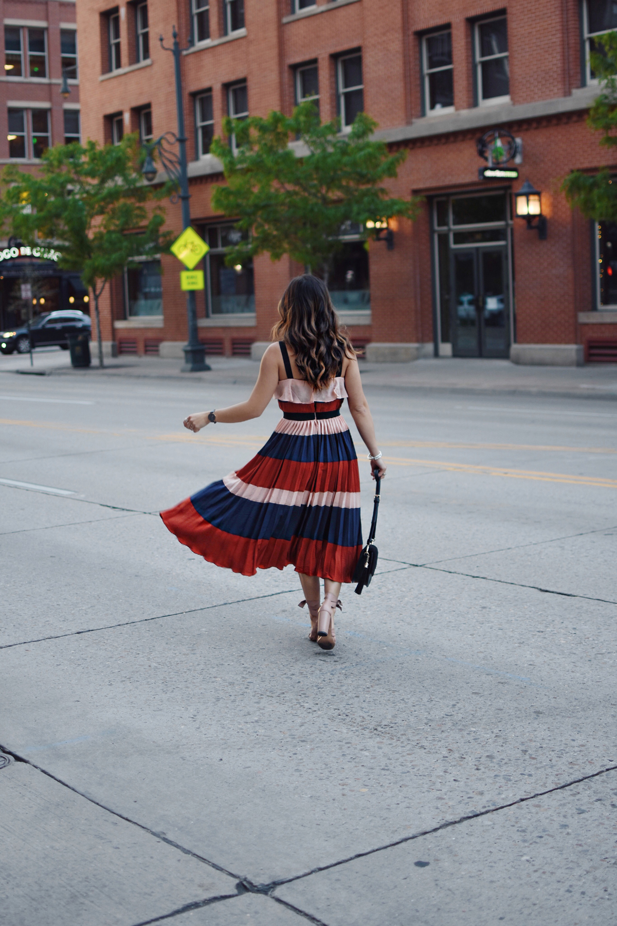 Carolina Hellal of Chic Talk wearing an Endless Rose striped midi dress via shopbop