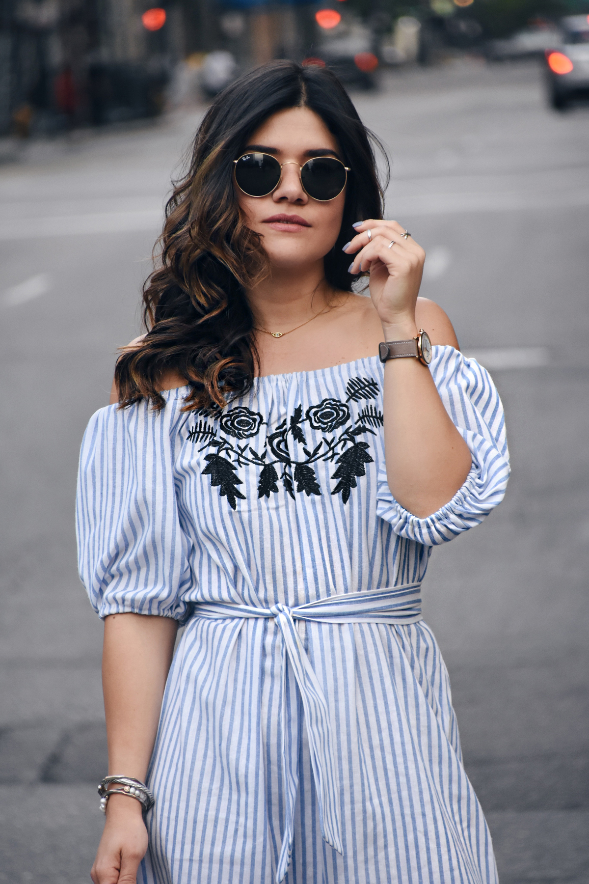 Carolina Hellal of Chic Talk wearing an off the shoulder shein dress, rayban sunglasses, marc jacobs watch and rebrecca minkoff shoes