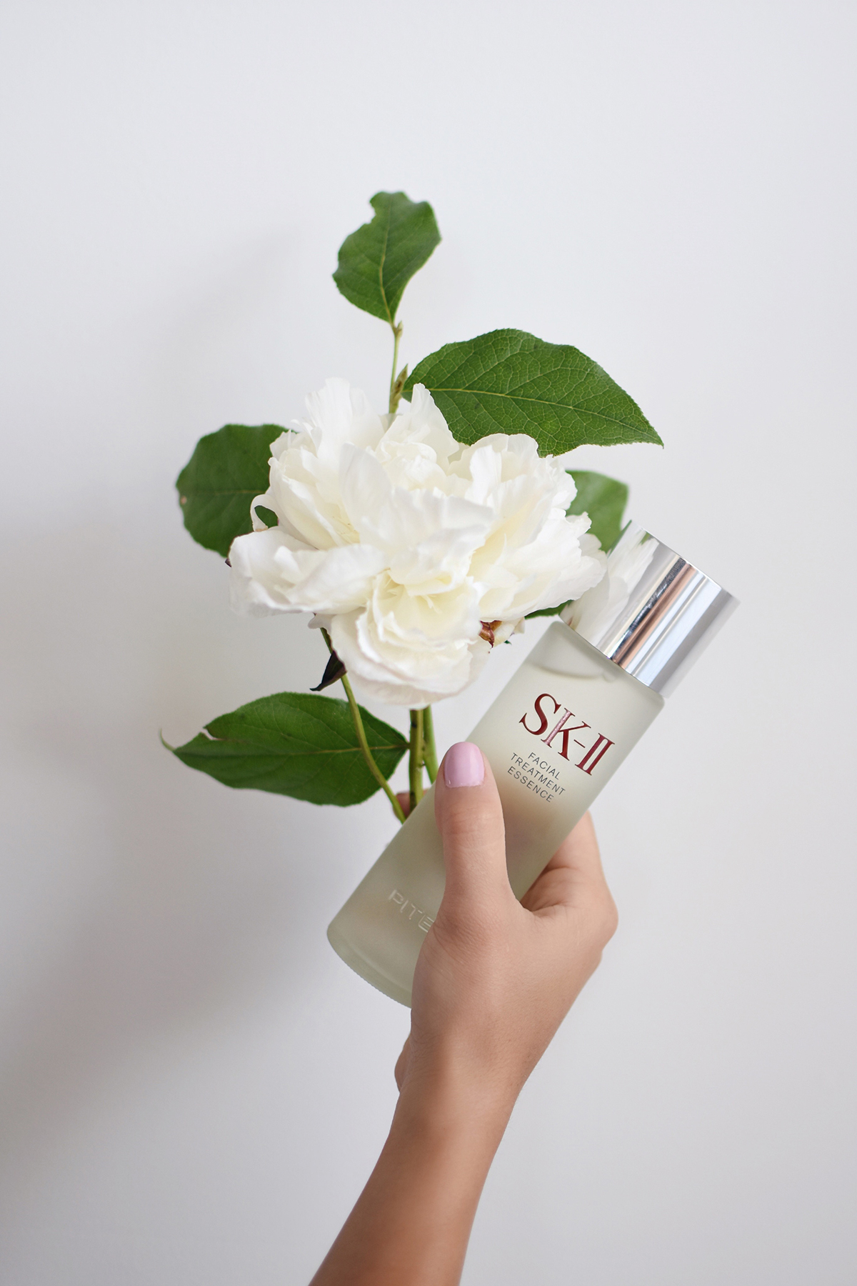 SK-II Facial Treatment Essence - TIPS FOR GLOWING SKIN WITH SK-II by popular Denver beauty blogger Chic Talk