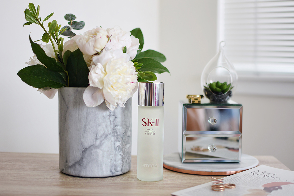 Carolina Hellal of Chic Talk using SK-II Facial Treatment Essence - TIPS FOR GLOWING SKIN WITH SK-II by popular Denver beauty blogger Chic Talk