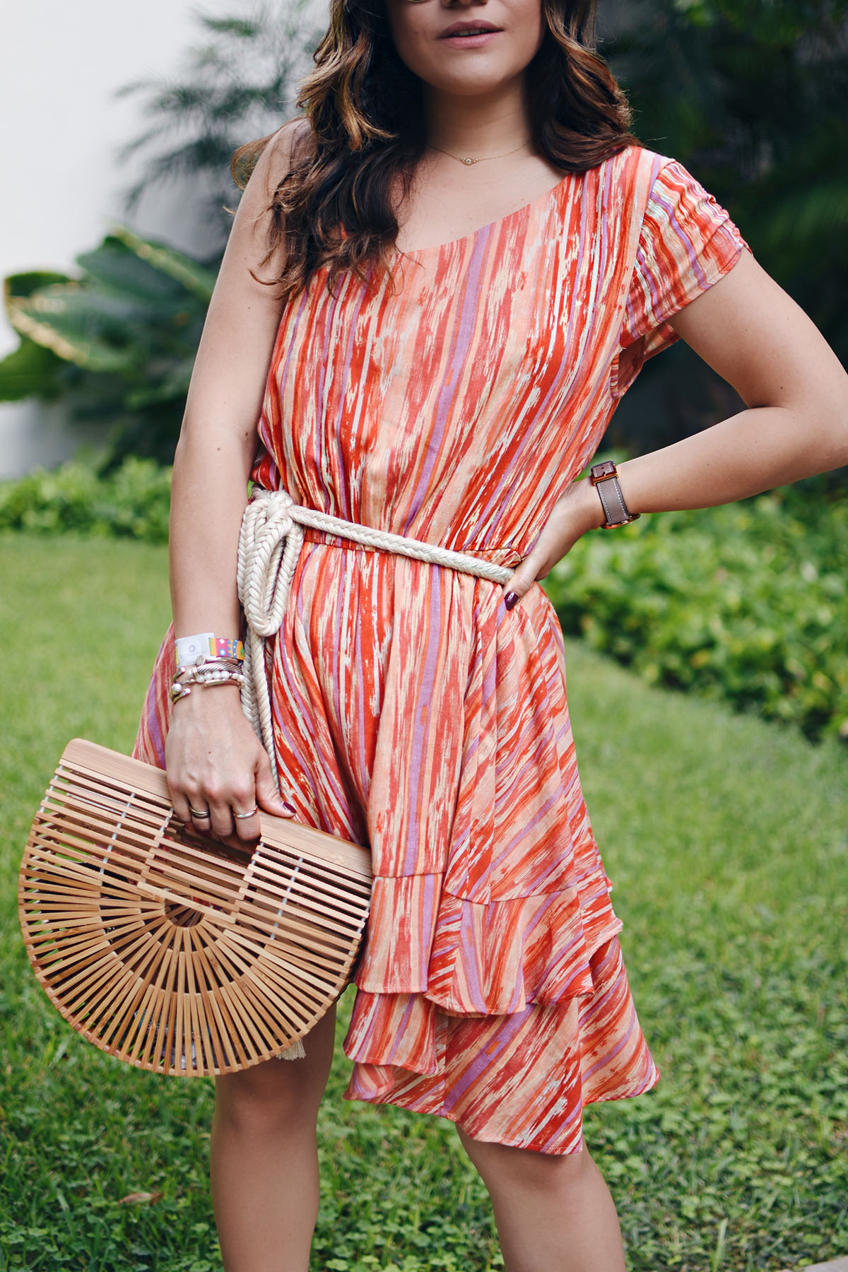 Carolina Hellal of Chic Talk wearing a Free People mini dress, Cultagaia ark bag , Rebecca Minkoff lace up sandals and Rayban sunglasses in Mexico. 