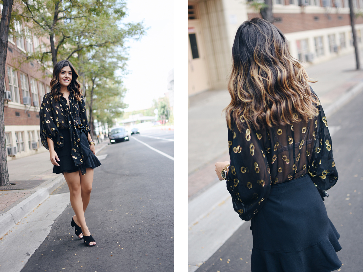 Carolina Hellal for Chic Talk wearing a DVF black top via Current Boutique, an online vintage and second hand-store.