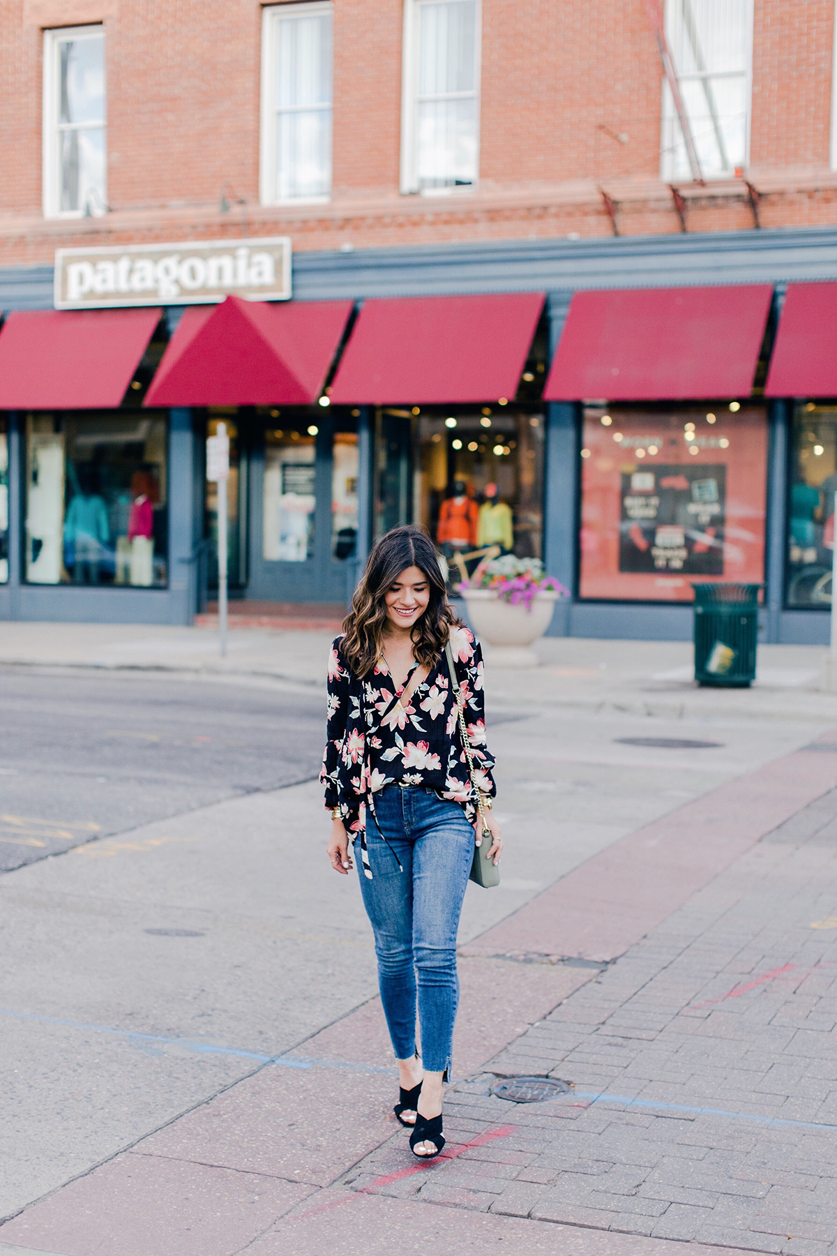 Carolina Hellal of Chic Talk wearing a floral top and Current Elliot jeans from the Nordstrom Anniversary Sale 2017
