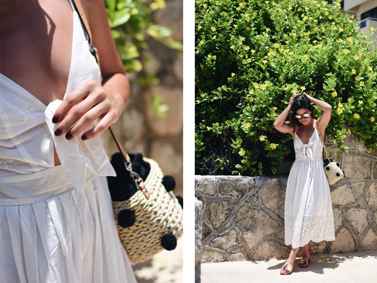 Carolina Hellal of Chic Talk wearing a J.O.A white summer dress, Rebecca Minkoff straw pom pom bag and Forever21 tassel sandals