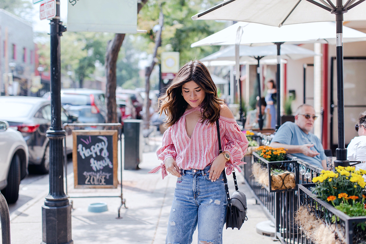 Carolina Hellal of Chic Talk wearing h&m boyfriend jeans, shein off the shoulder top, chinese laundry sandals and Rebecca Minkoff sandals