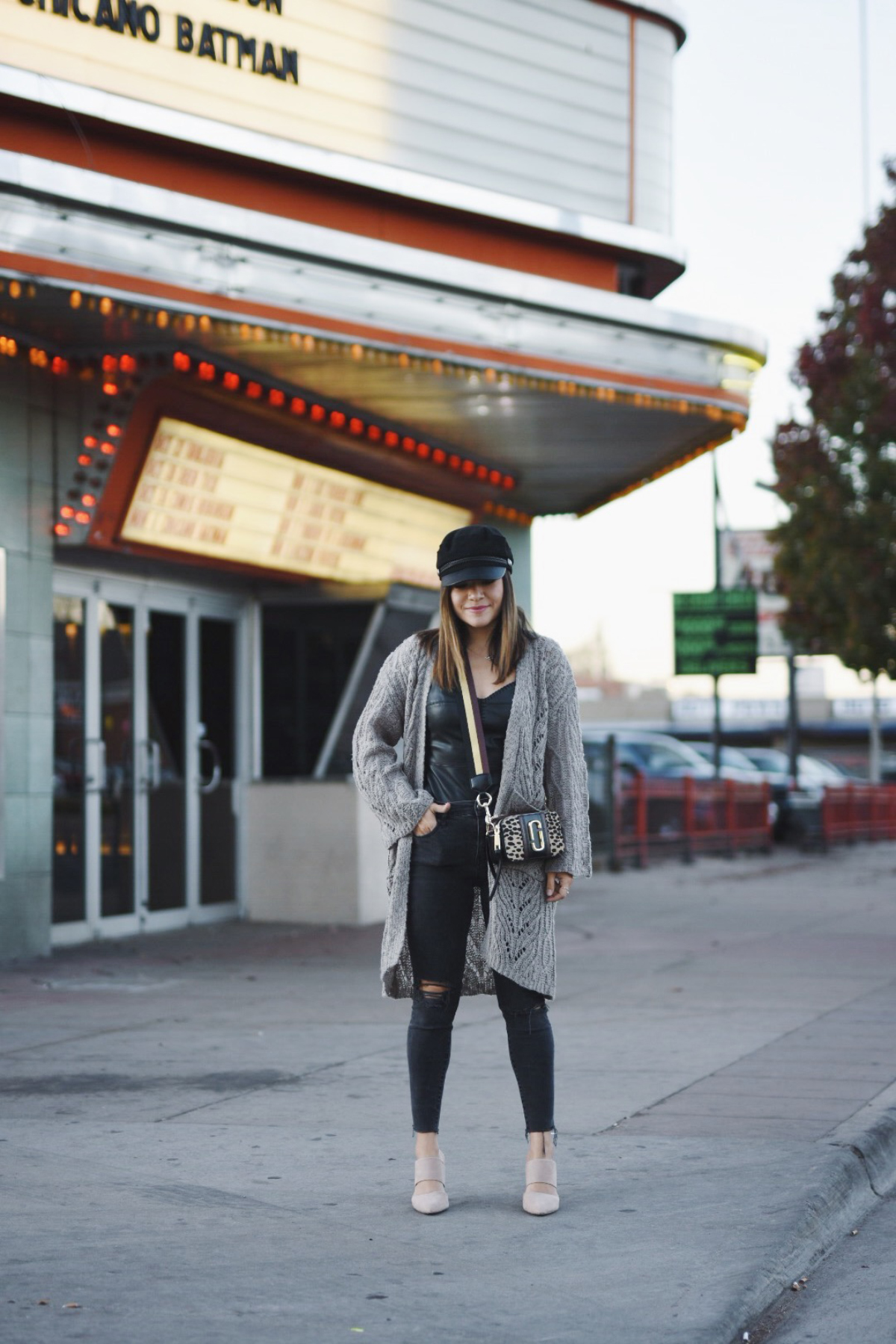 Carolina Hellal of Chic Talk wearing an h&m fisherman cap, Marc jacobs crossbody bag, madewell jeans, chicwish cardigan and nude mules