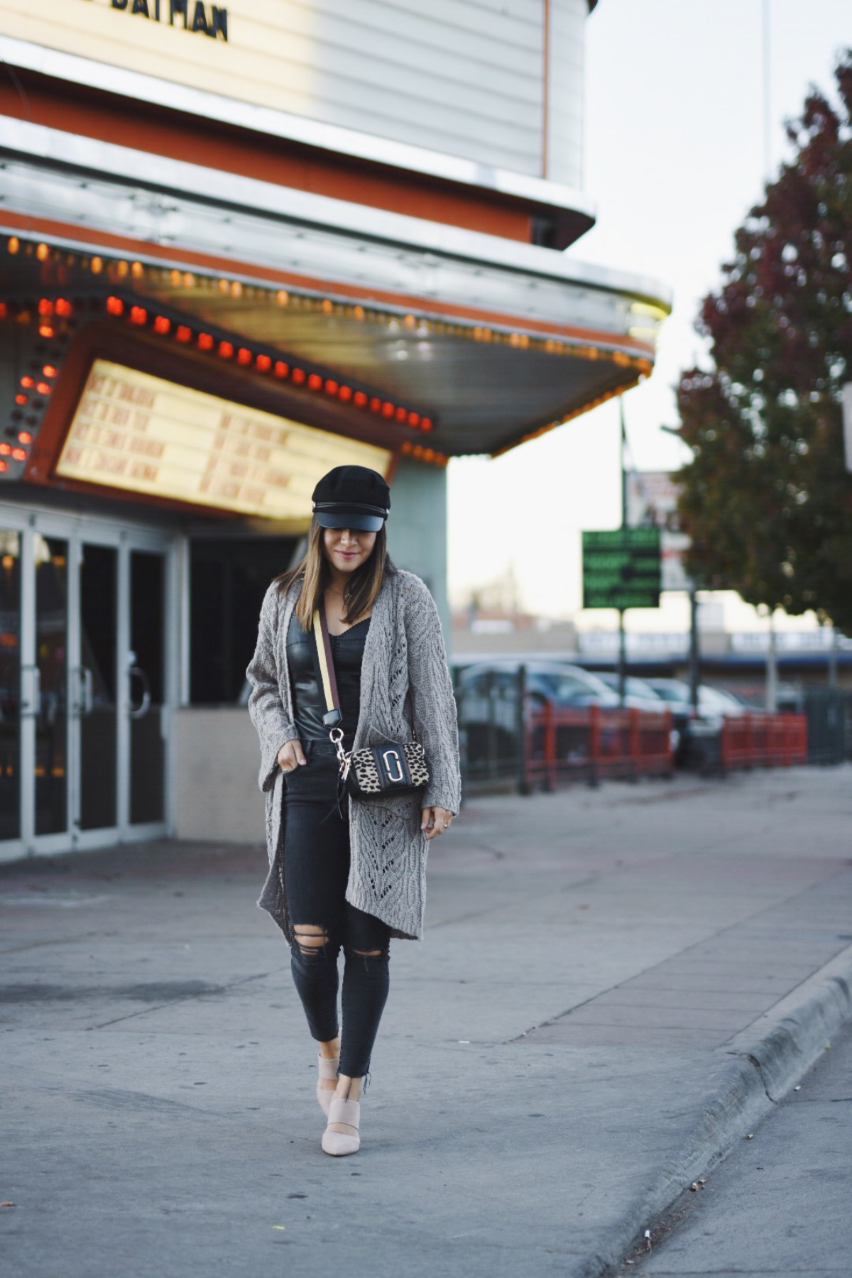 Carolina Hellal of Chic Talk wearing an h&m fisherman cap, Marc jacobs crossbody bag, madewell jeans, chicwish cardigan and nude mules