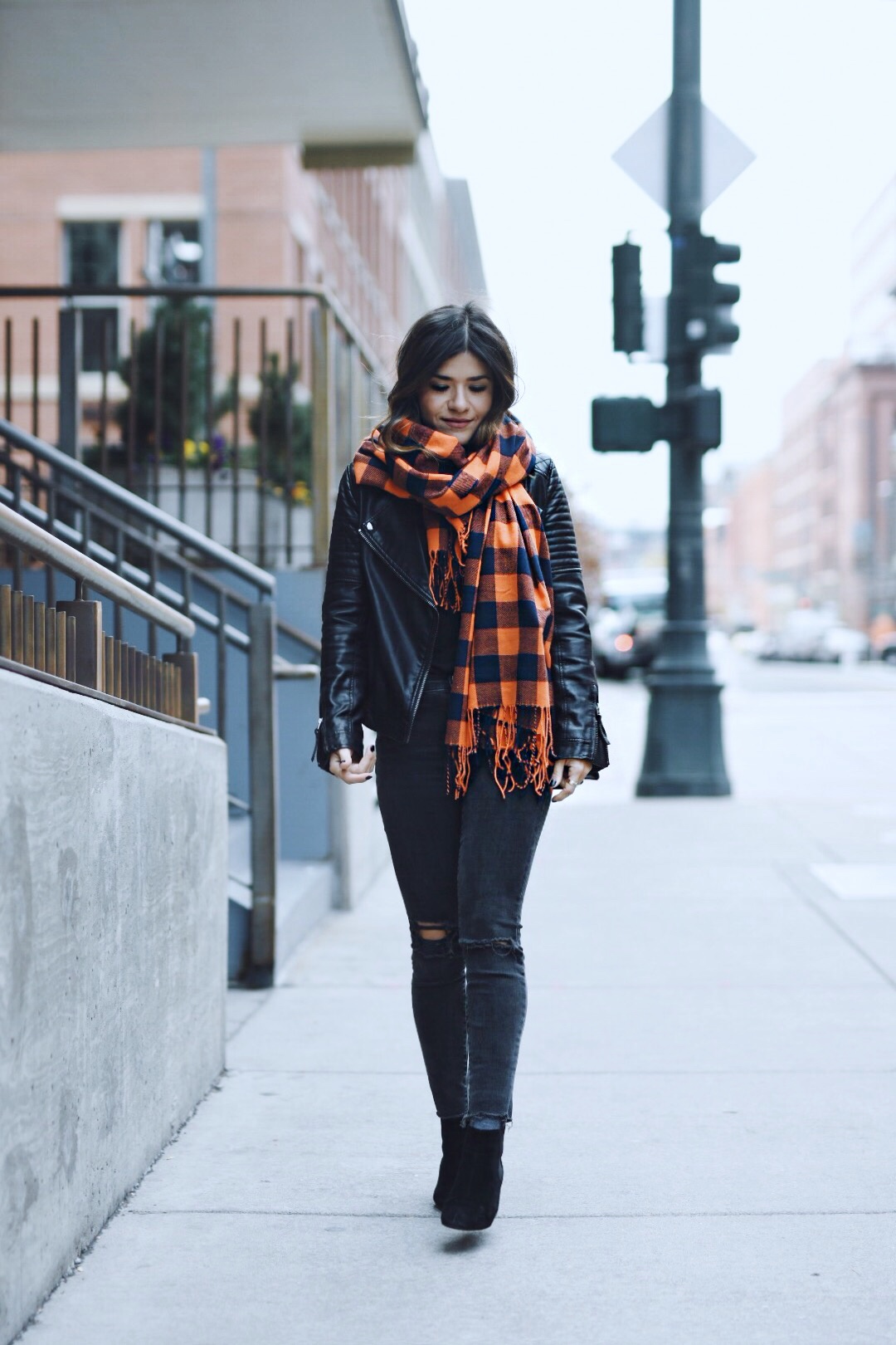 Carolina Hellal of Chic Talk wearing a Broncos scarf, madewell jeans, topshop faux leather jacket and rebecca minkoff bag