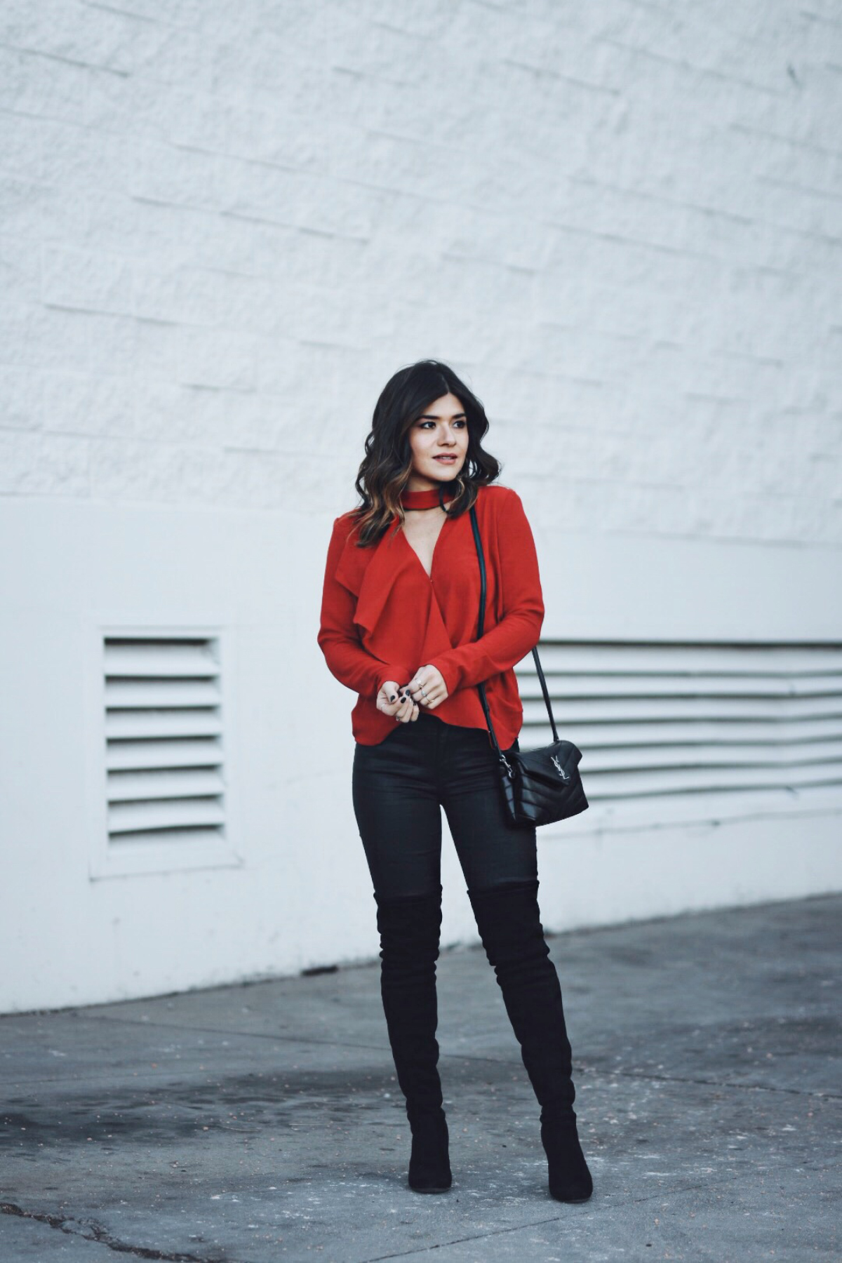 Carolina Hellal of Chic Talk wearing B.P red top, Current Elliot waxed jeans, Shein coat and YSL crossbody bag. 