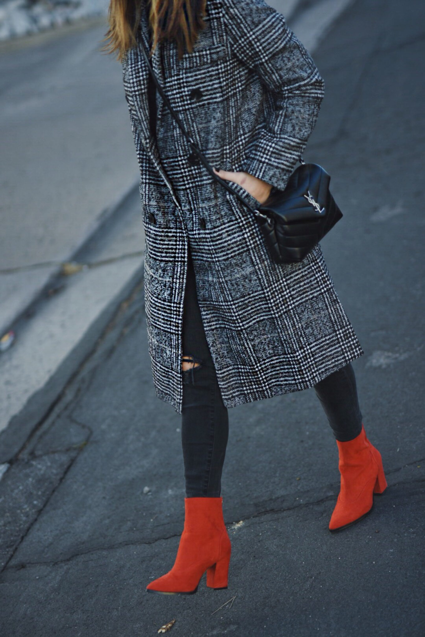 Carolina Hellal of Chic Talk wearing a Shein check print coat, River Island red boots, Madewell jeans and YSL crossbody bag.