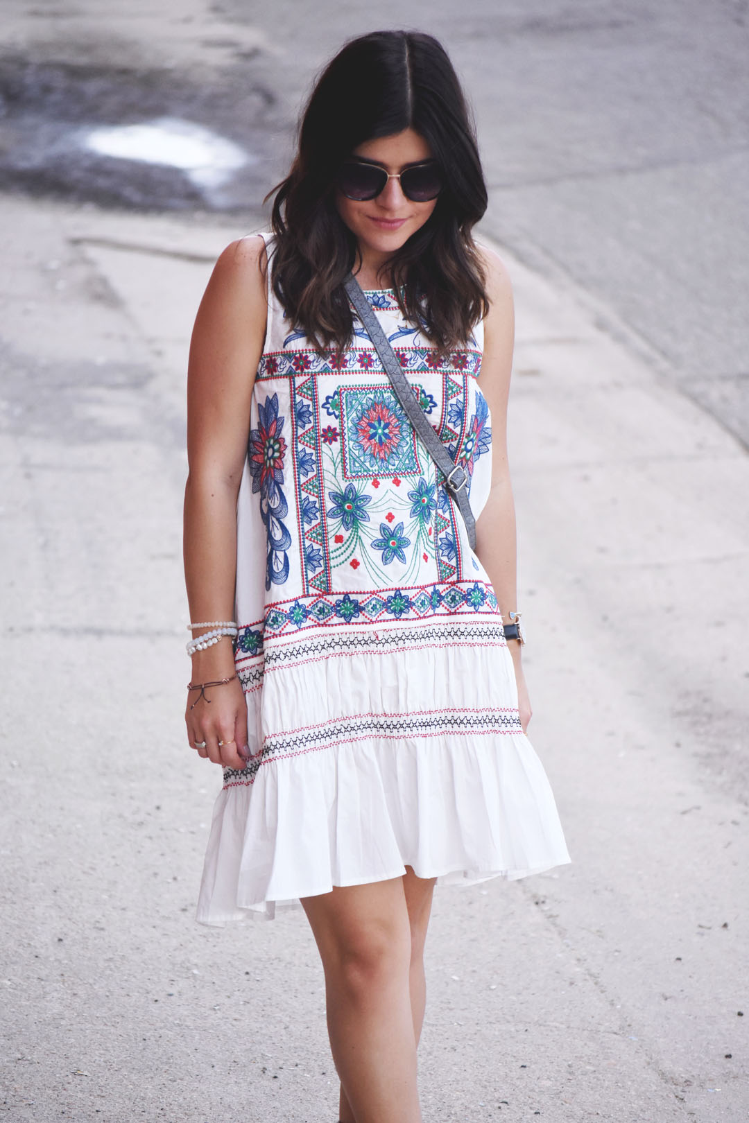 Carolina Hellal of the fashion blog Chic Talk wearing a Chicwish white embroidered dress and Nordstrom sunglasses - BOHO EMBROIDERED SUMMER DRESS by popular Denver fashion blogger Chic Talk