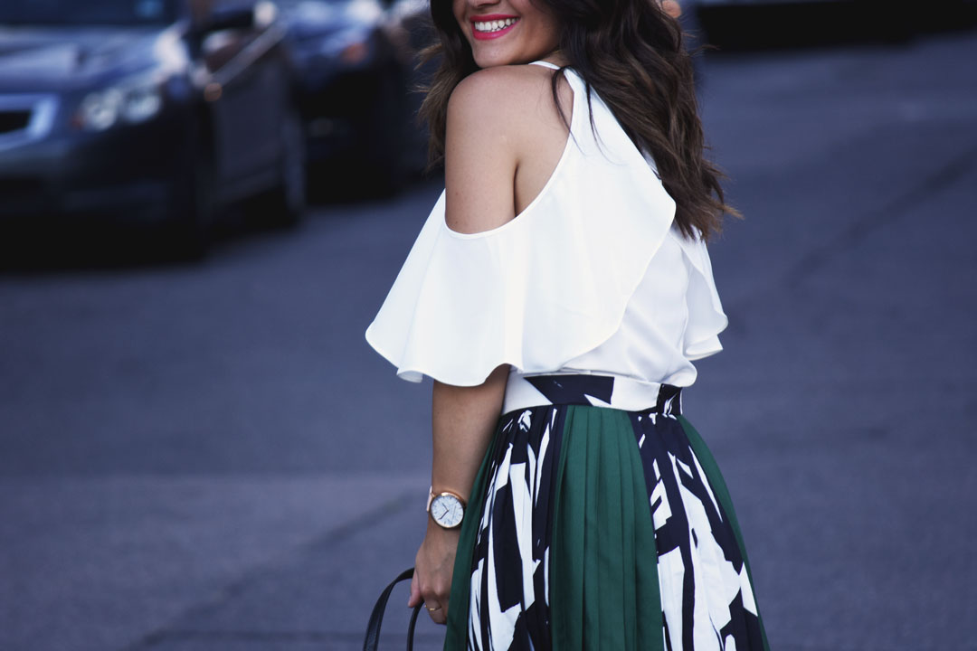 Carolina Hellal of Chic Talk wearing Chicwish cold shoulder white top - PLEATED MIDI SKIRT AND COLD SHOULDER TOP by popular Denver fashion blogger Chic Talk