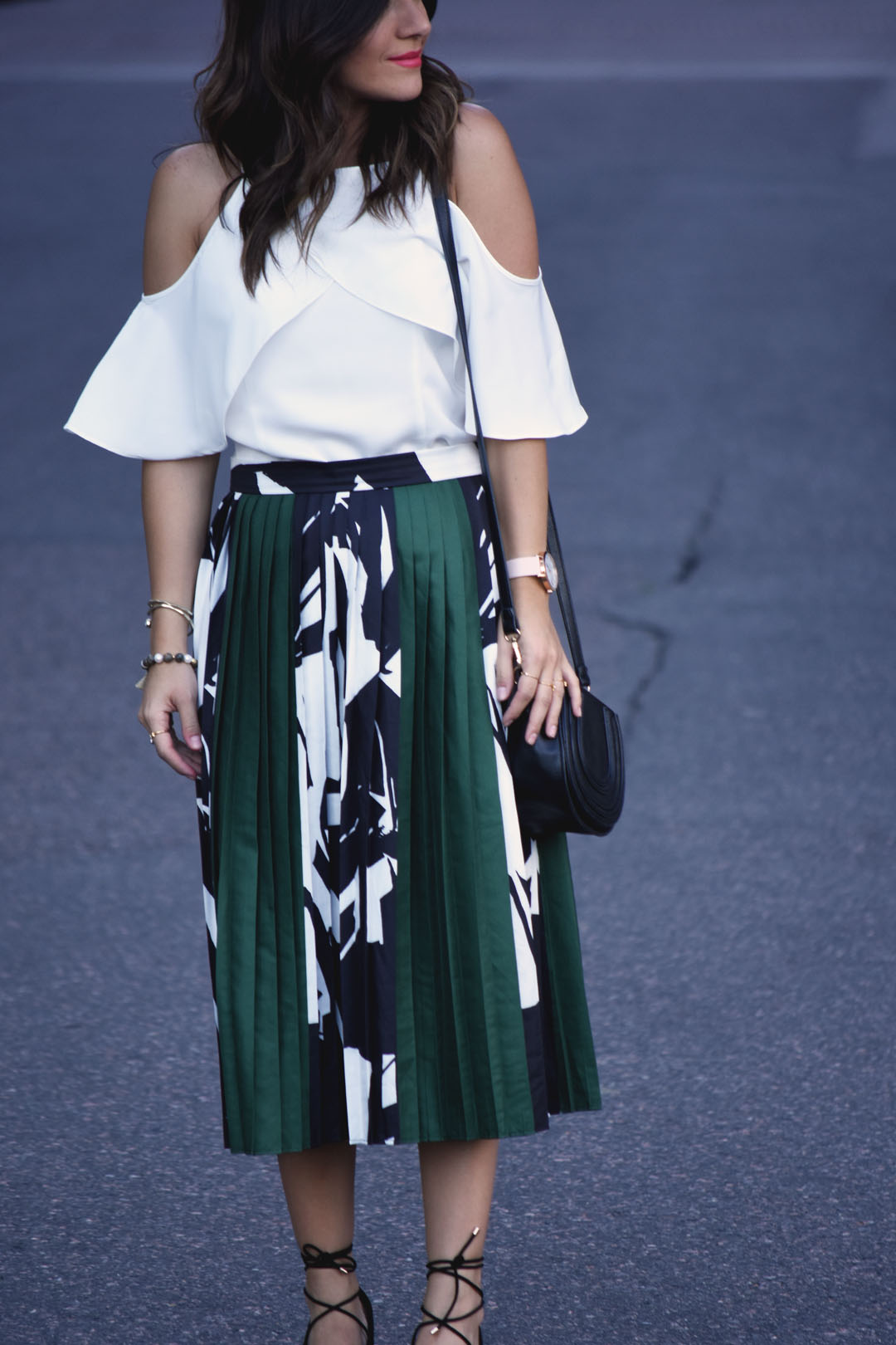 Carolina Hellal of Chicwish cold shoulder top, printed pleated midi skirt, and Mellow World fashion body crossbag - PLEATED MIDI SKIRT AND COLD SHOULDER TOP by popular Denver fashion blogger Chic Talk