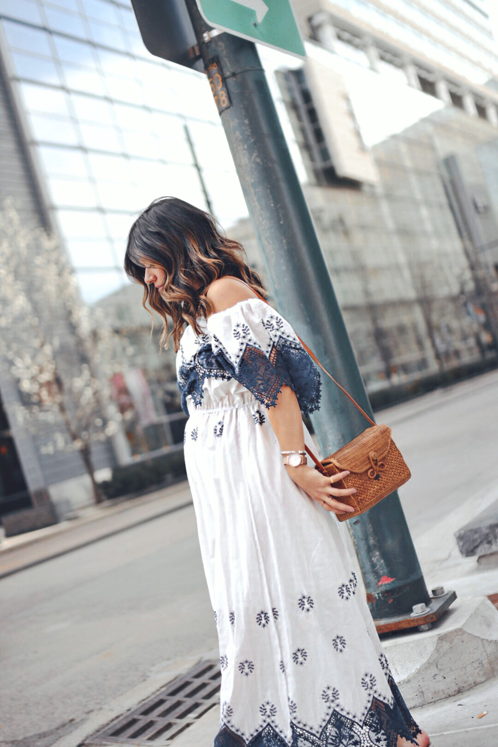 Carolina Hellal wearing a Chicwish maxi dress, woven bag and beige slides - STATEMENT DRESSES featured by popular Denver fashion blogger, Chic Talk