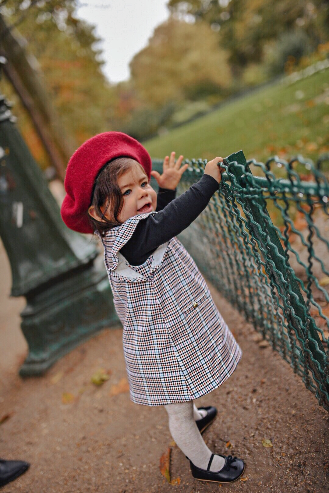 My baby Sofia Jaramillo wearing a Janie and Jack plaid dress and beret, black turtle neck, Target white tights and Old Navy black flats in Paris . 