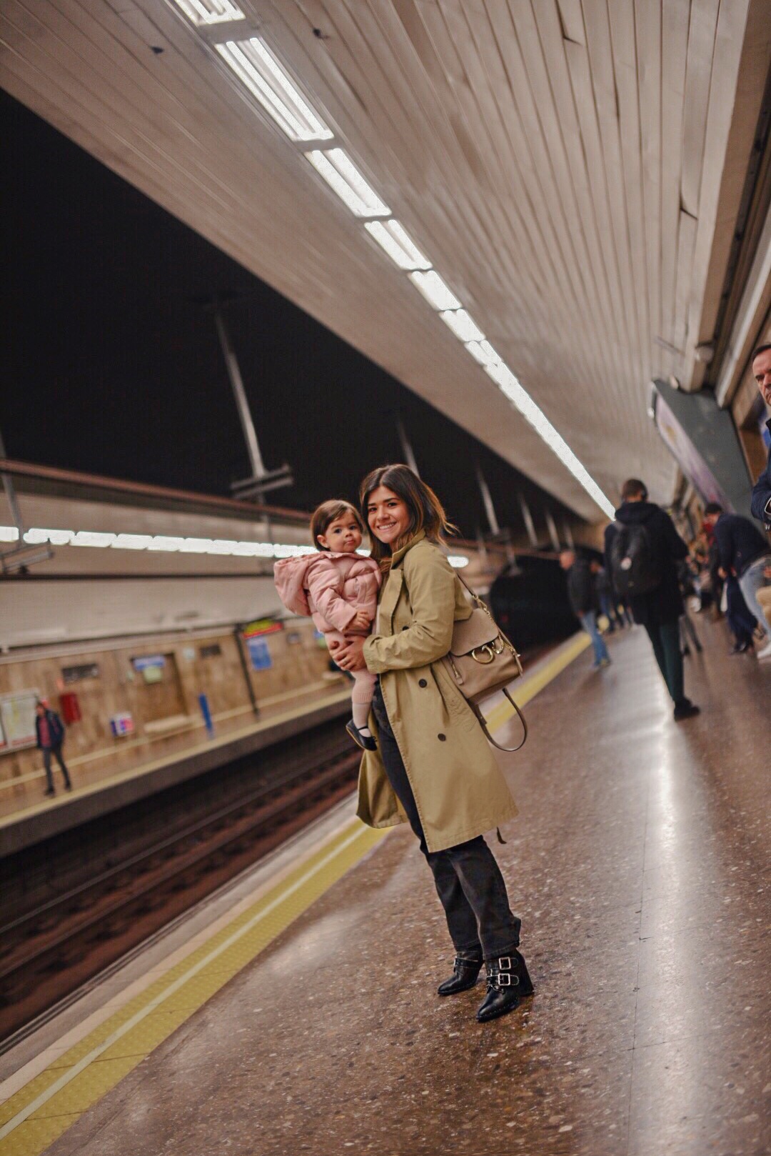 Carolina Hellal and her baby sofia at a trian station in Madrid, Spain.