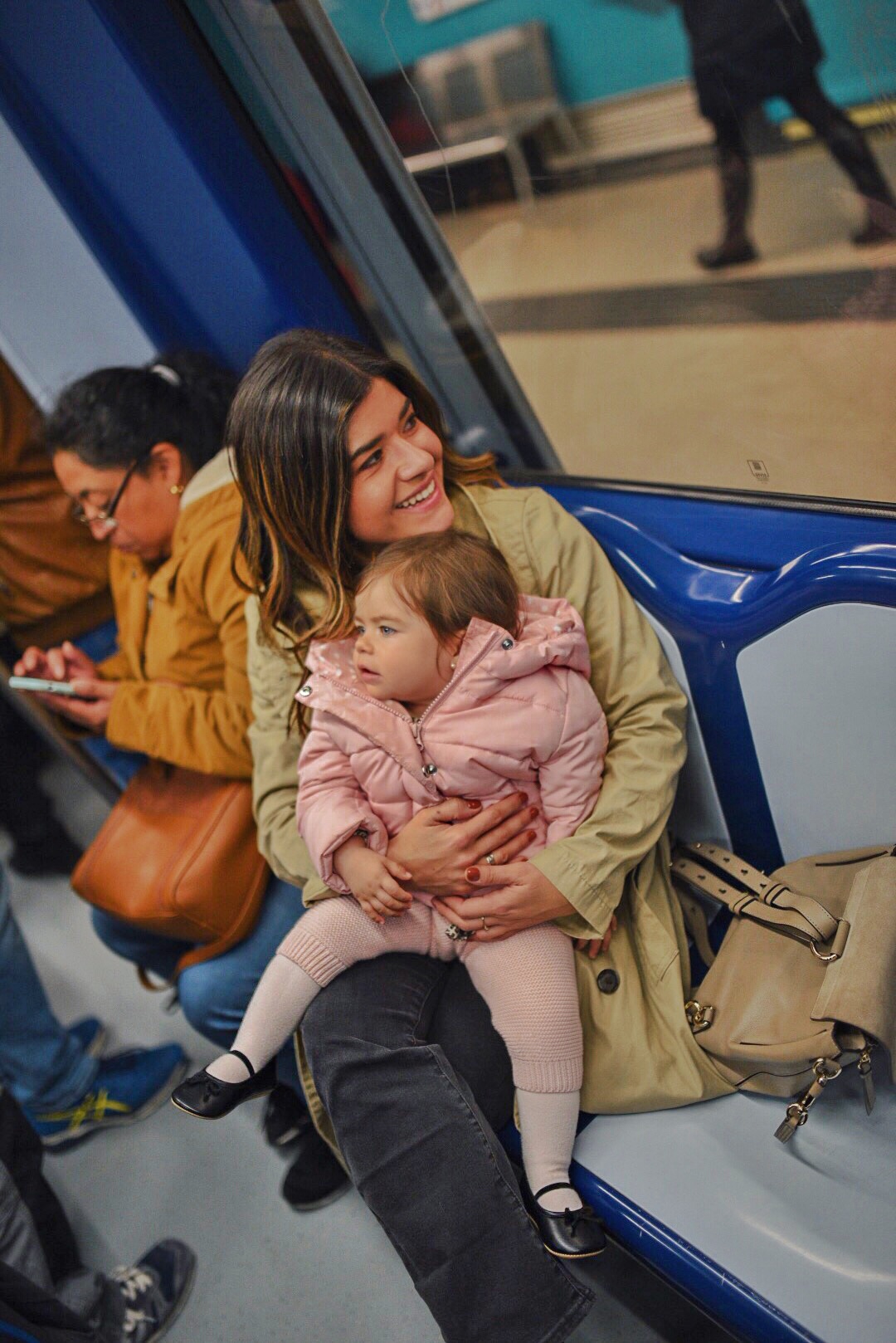 Carolina Hellal and her baby sofia at a trian station in Madrid, Spain.