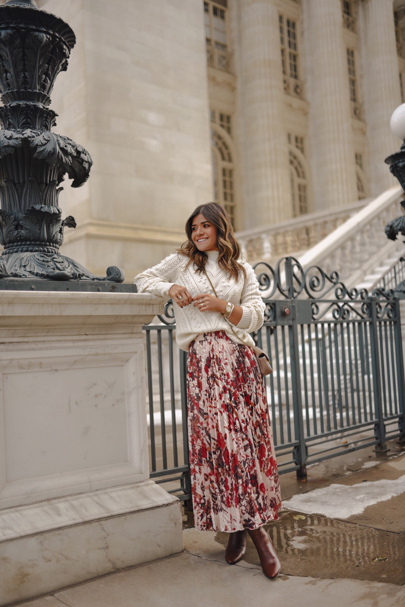 Carolina Hellal of Chic Talk wearing a Sezane knit sweater, h&m floral maxi skirt, Aersoles tall botos and Gucci Marmont crossbody bag