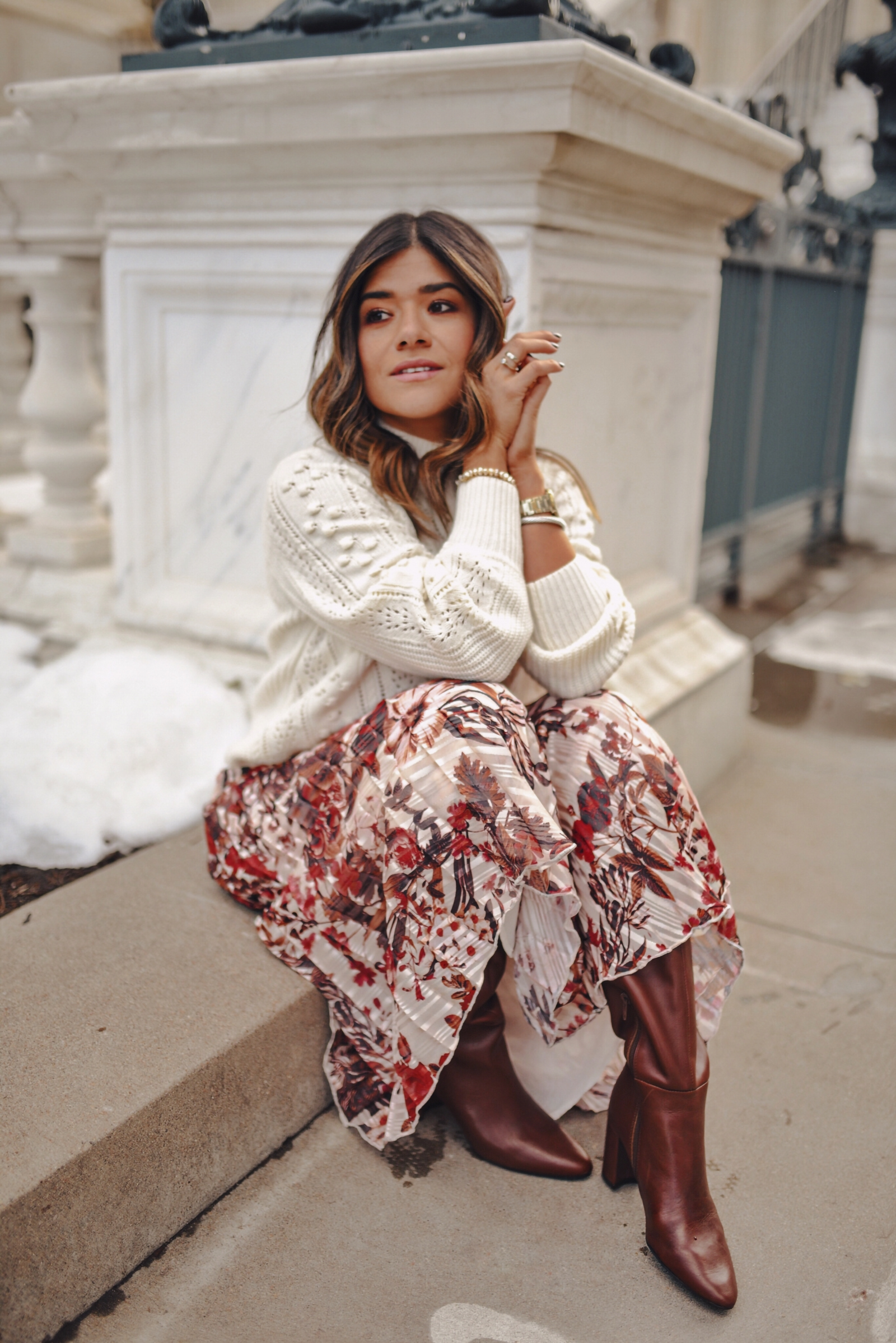 Carolina Hellal of Chic Talk wearing a Sezane knit sweater, h&m floral maxi skirt, Aersoles tall botos and Gucci Marmont crossbody bag