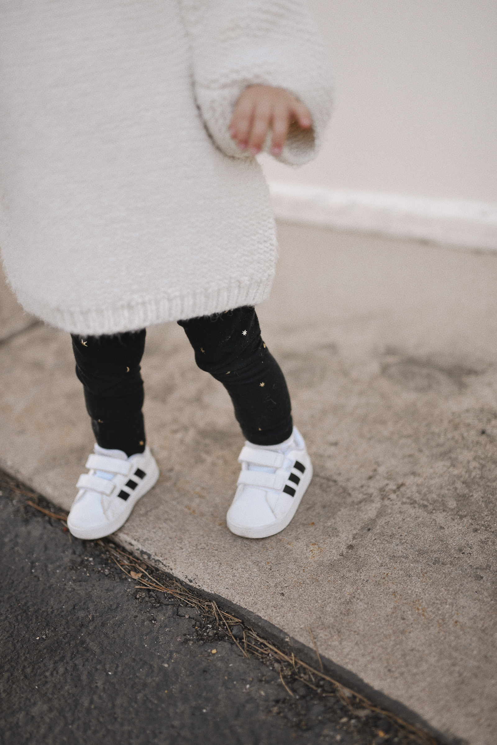 Carolina Hellal of Chic Talk and her daughter Sofia Jaramillo-Hellal wearing matching outfits in Adidas white sneakers