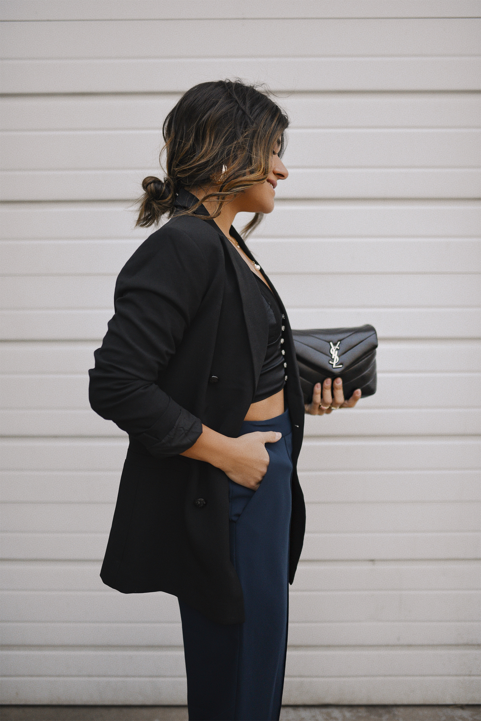 Carolina Hellal of Chic Talk wearing topshop navy blue trousers, Zara black crop top, H&M black blazer and YSL black crossbody bag. 