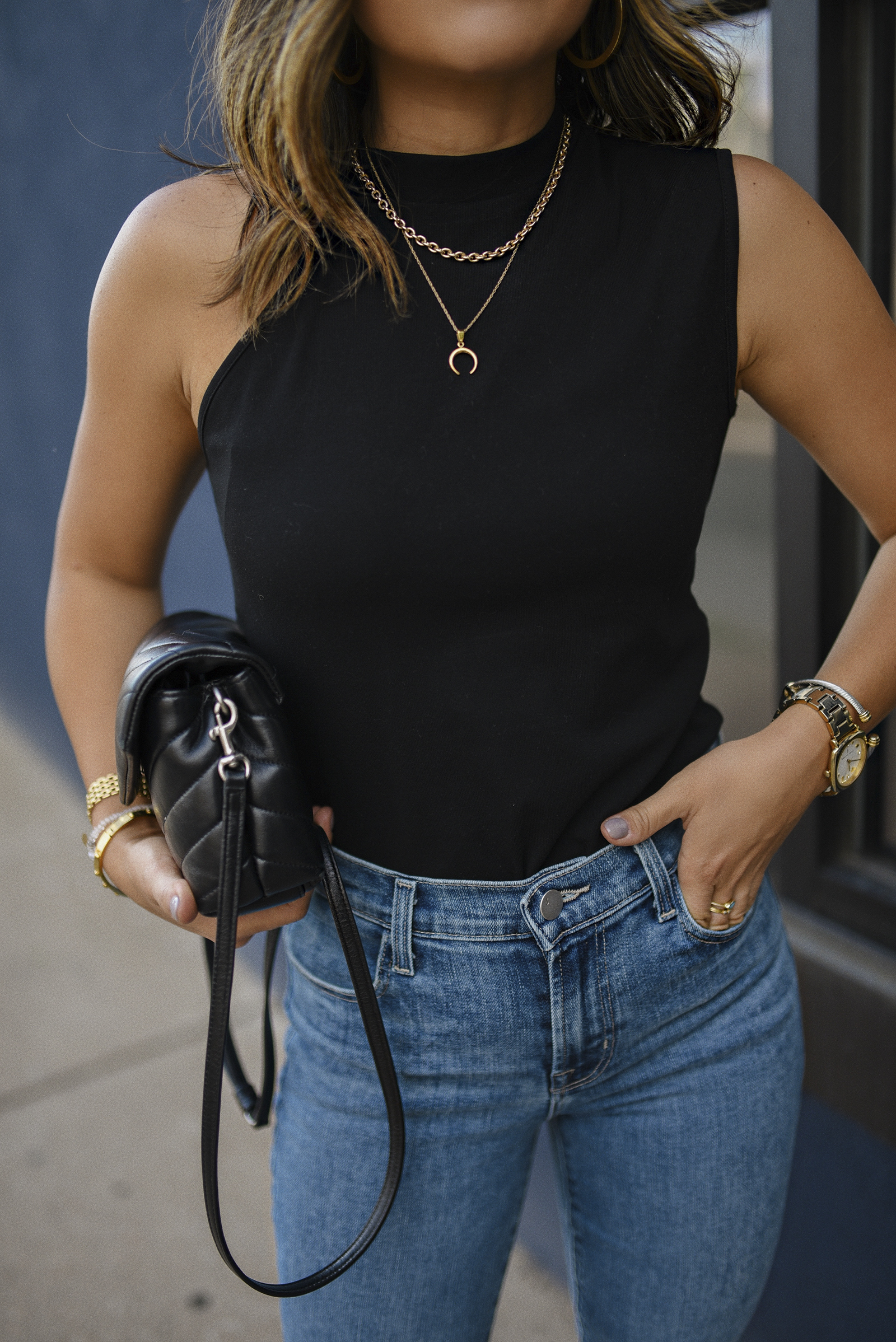 Carolina Hellal of Chic Talk wearing a Chicwish black top,Tenth and Spruce wool blazer, JBrand skinny jeans and YSL black crossbody bag.