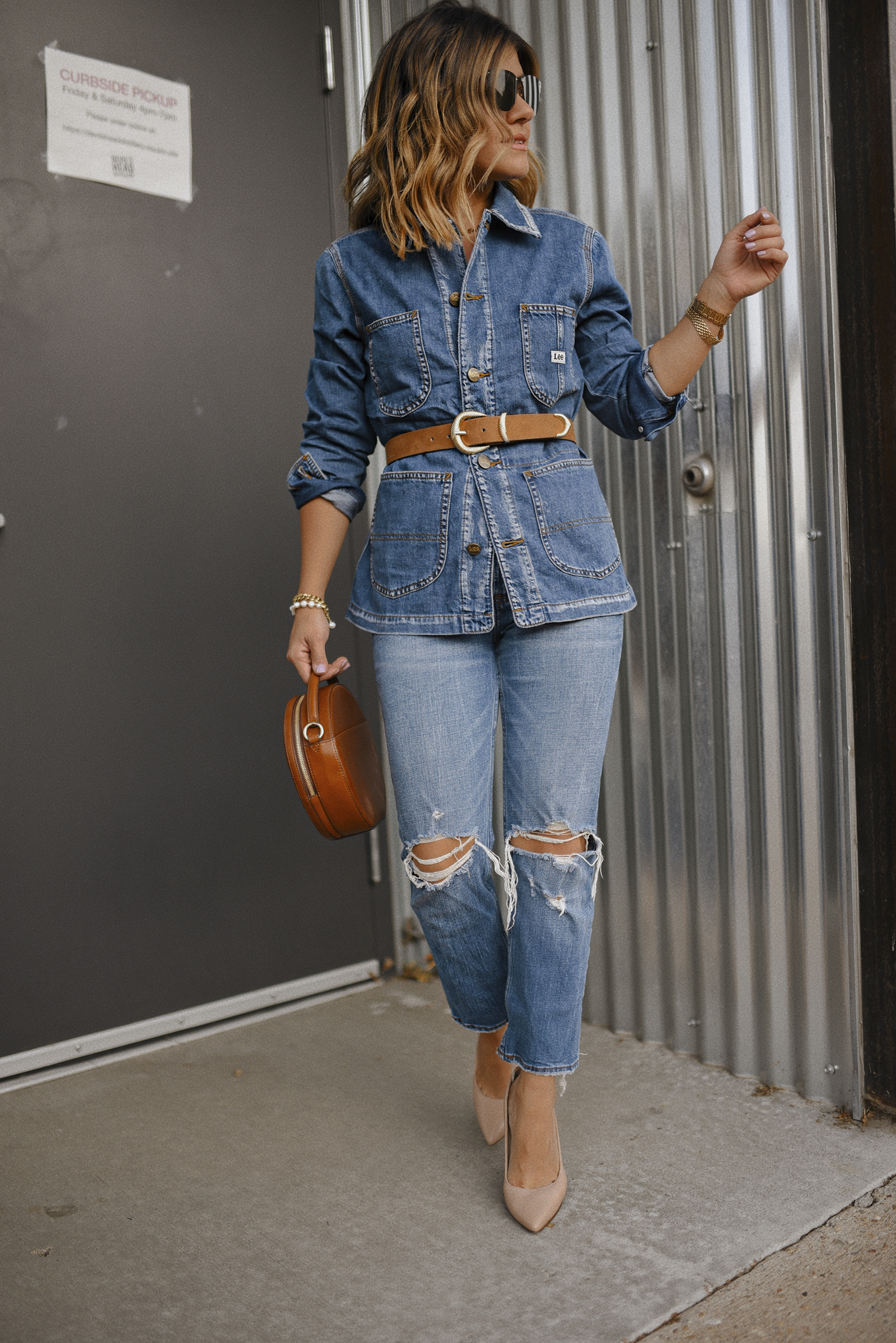 Carolina Hellal of Chic Talk wearing a denim jacket by Lee, Abercrombie straight leg jeans and Sam Edelman nude pumps. 