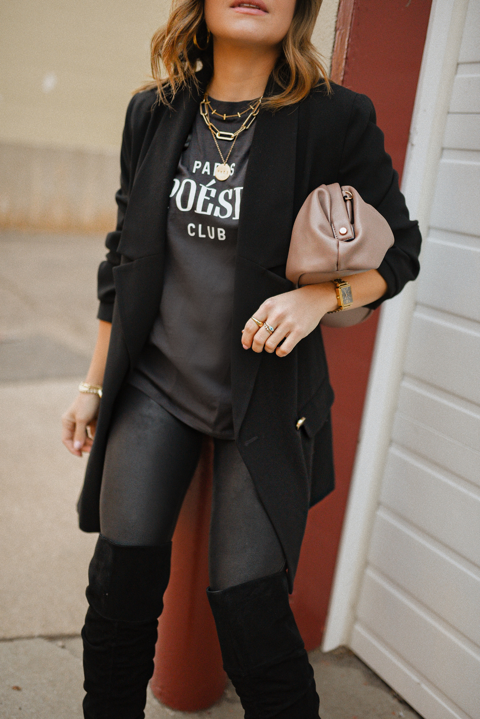 Carolina Hellal of Chic Talk wearing a total black look with an H&M blazer and t-shirt, spanx leggings, Target bag and Vince Camuto over the knee boots. 