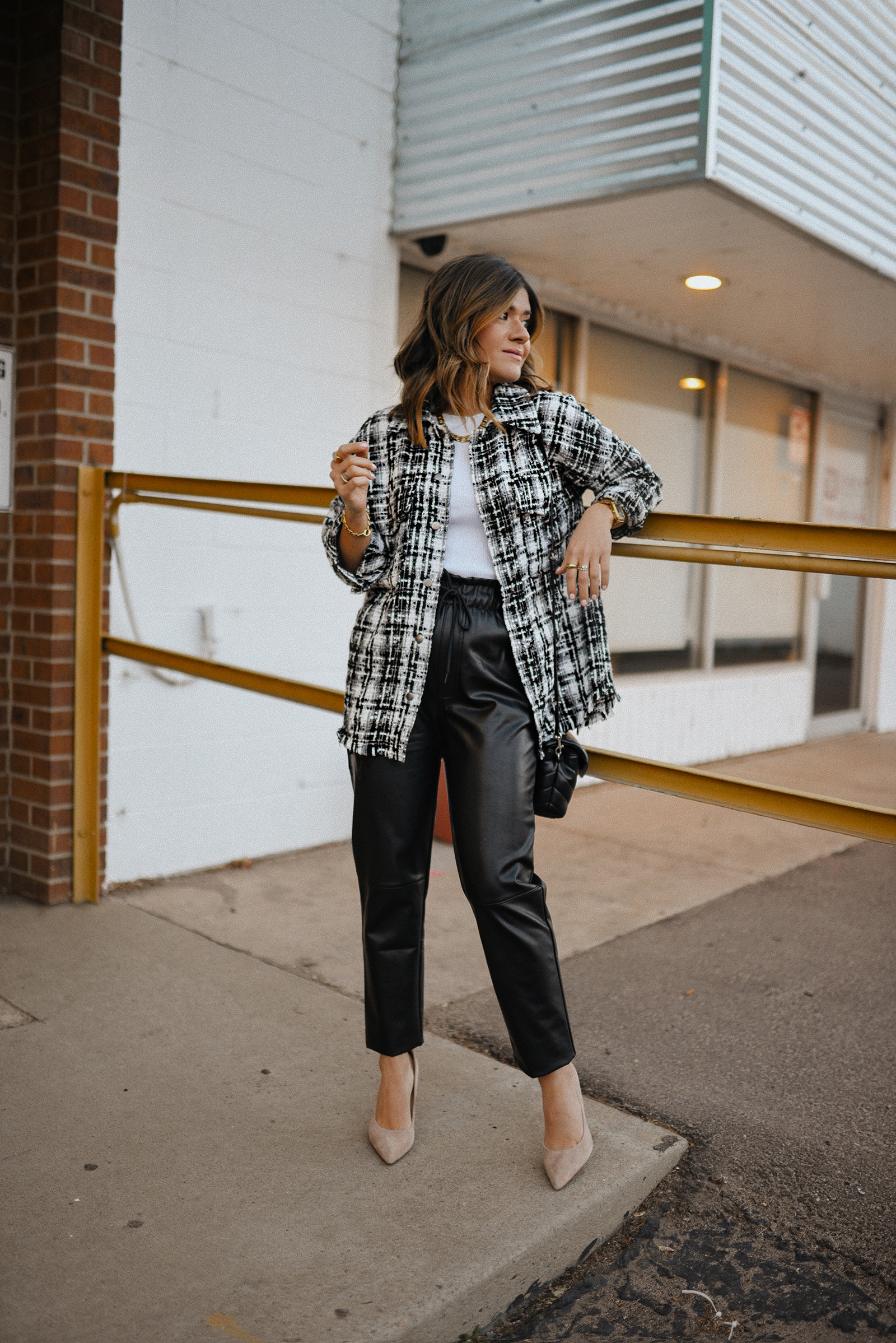 Carolina Hellal of Chic Talk wearing a Goodnight Macaroon plaid shirt, Abercrombie ribbed tank to and vegan pants and Sam Edelman suede pumps.