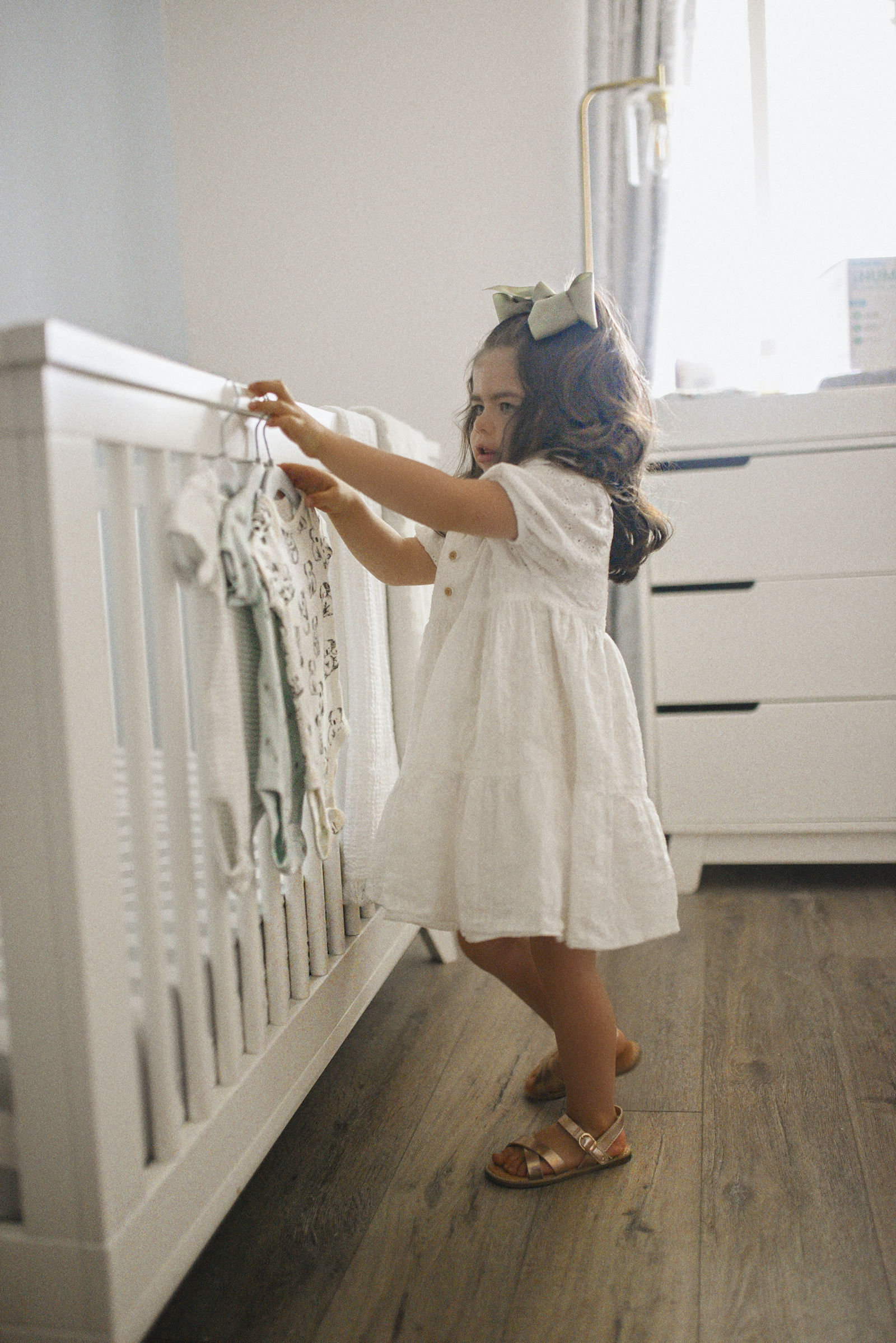 Sofia Jaramillo Hellal wearing a white eyelet dress via Target. 